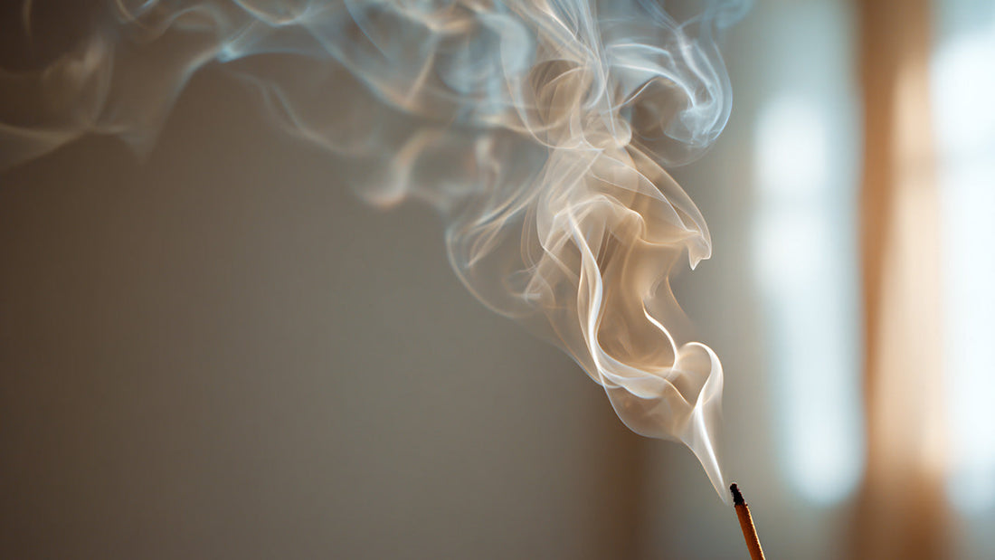 Soft streams of incense smoke rising in natural light, illustrating indoor air quality and the concept of clean incense.