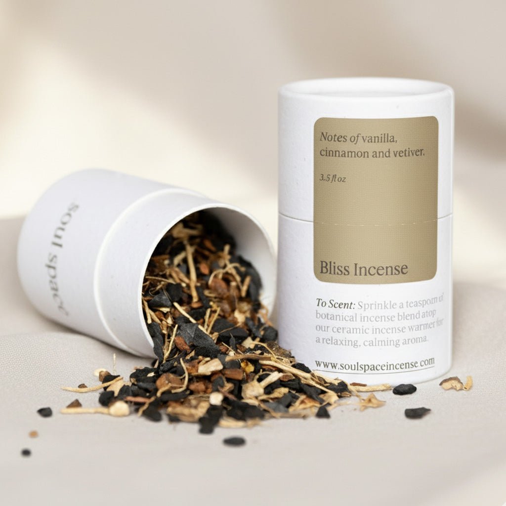 Bliss Incense with vanilla, opopanax, myrrh, and vetiver botanical blend on a soft surface