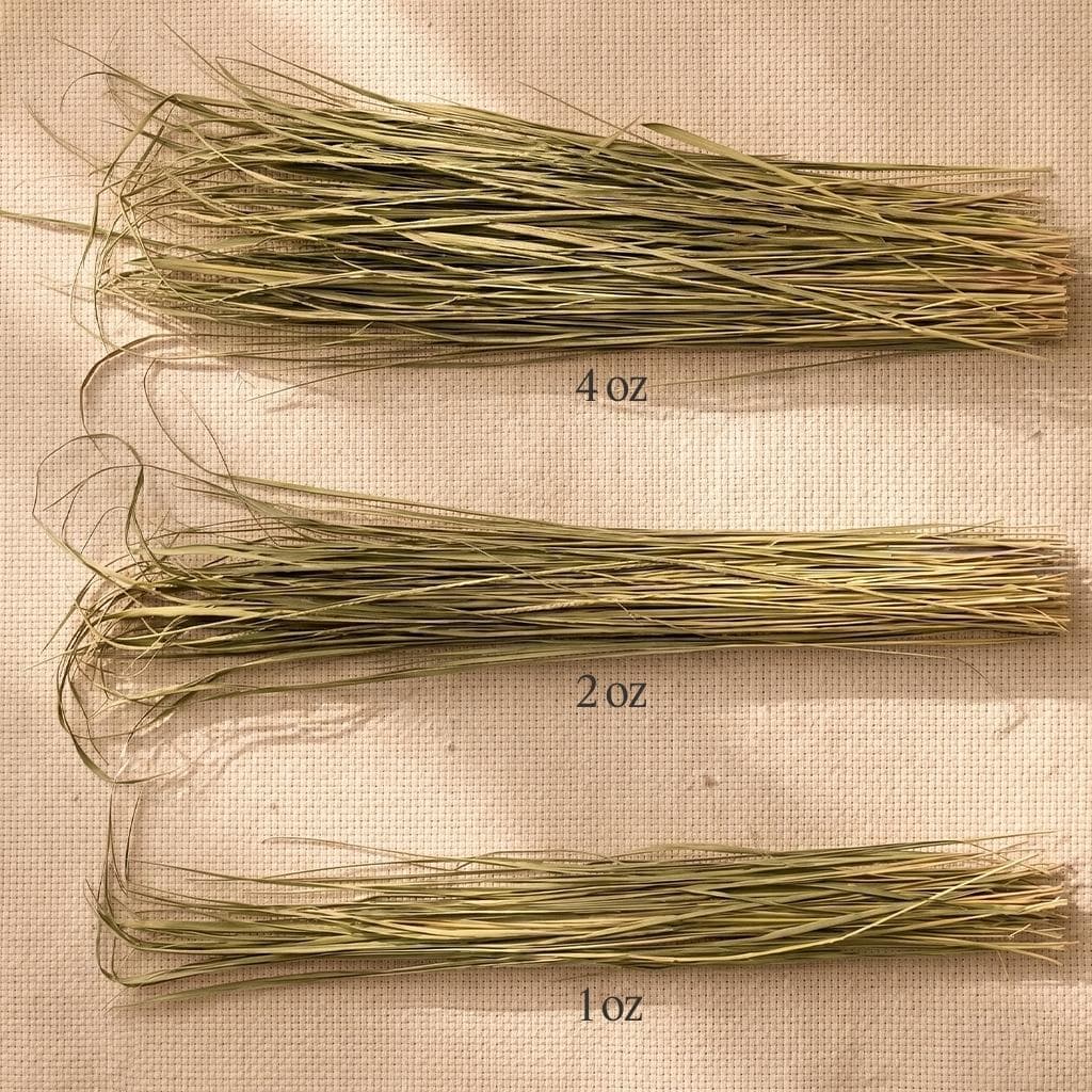 One ounce, two ounce, and four ounce loose sweetgrass bundles shown for scale