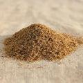 Fine Palo Santo wood powder from Peru on a neutral fabric surface