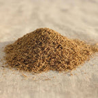 Fine Palo Santo wood powder from Peru on a neutral fabric surface